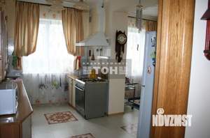 Коттедж 305м², 4-этажный, участок 15 сот.  