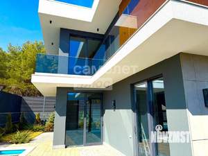 Коттедж 398м², 2-этажный, участок 5 сот.  